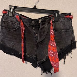 Free People dark wash denim shorts with belt
